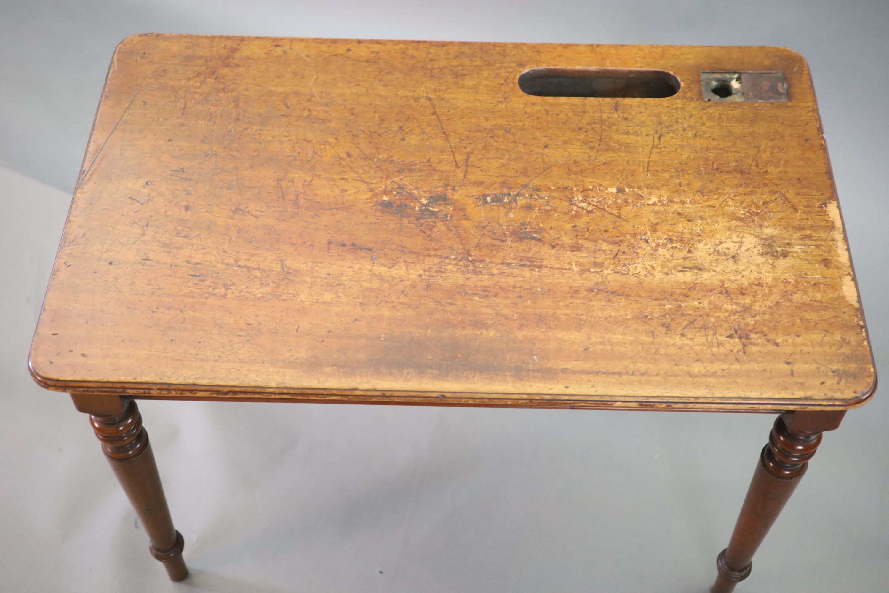 A pair of late Victorian mahogany writing tables, W.112cm D.68cm H.77.5cm